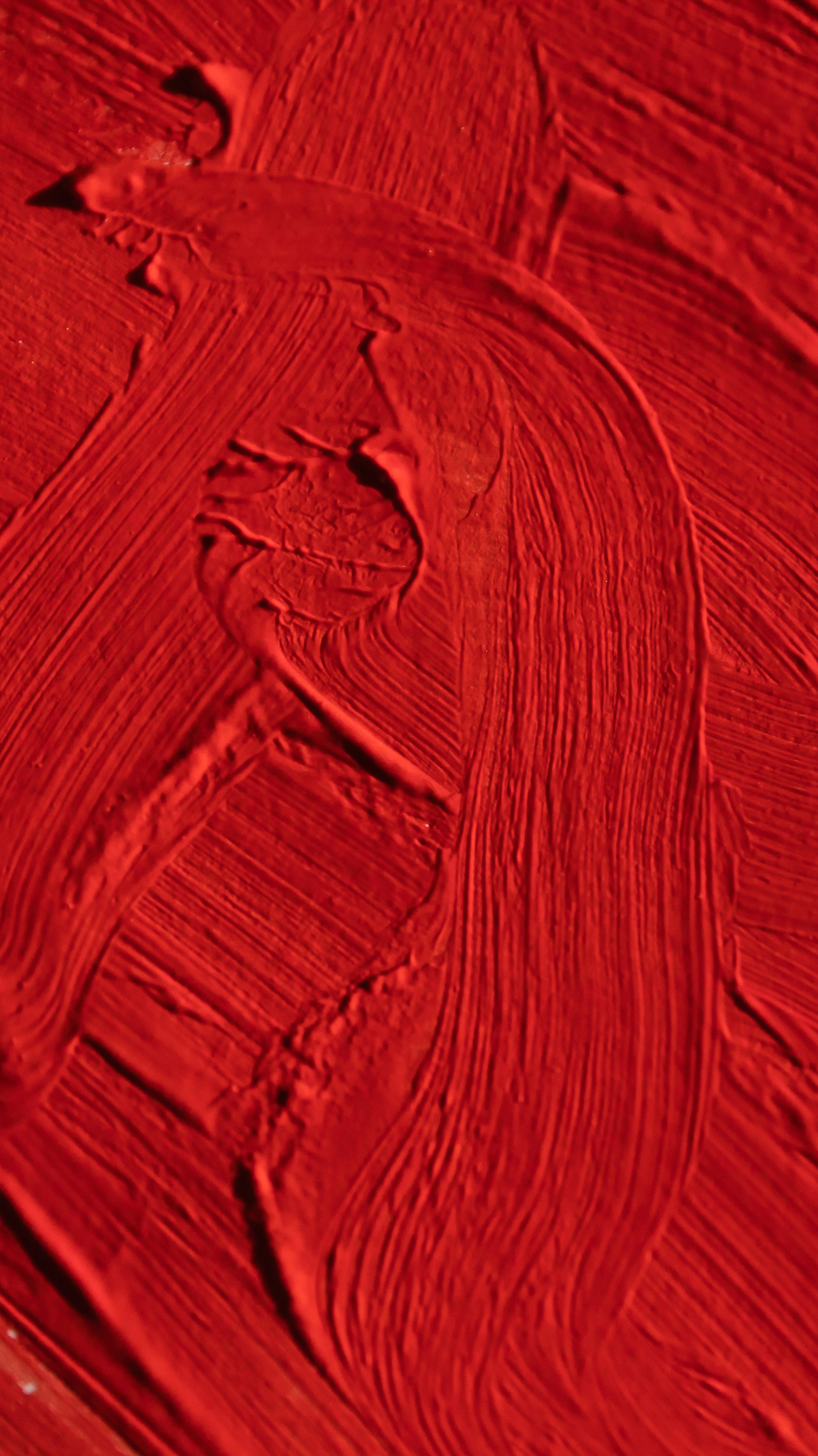Red abstract paint texture for fine art transport